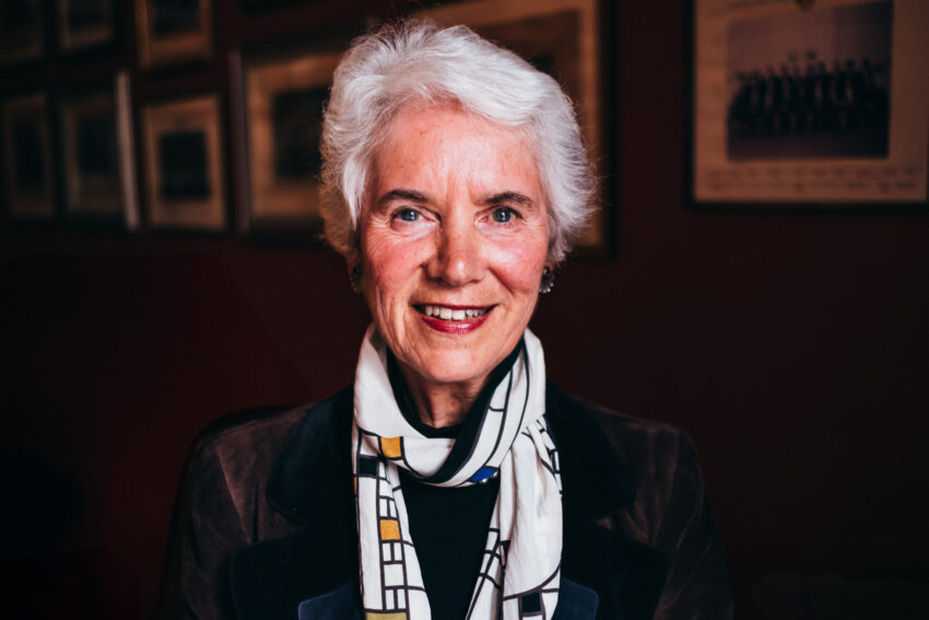 Portrait of a female author in beautifully soft window light.