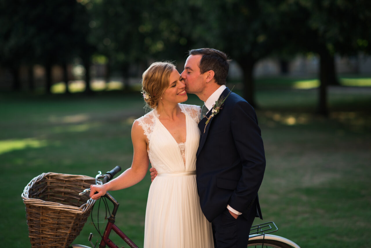 Bride and groom kiss.