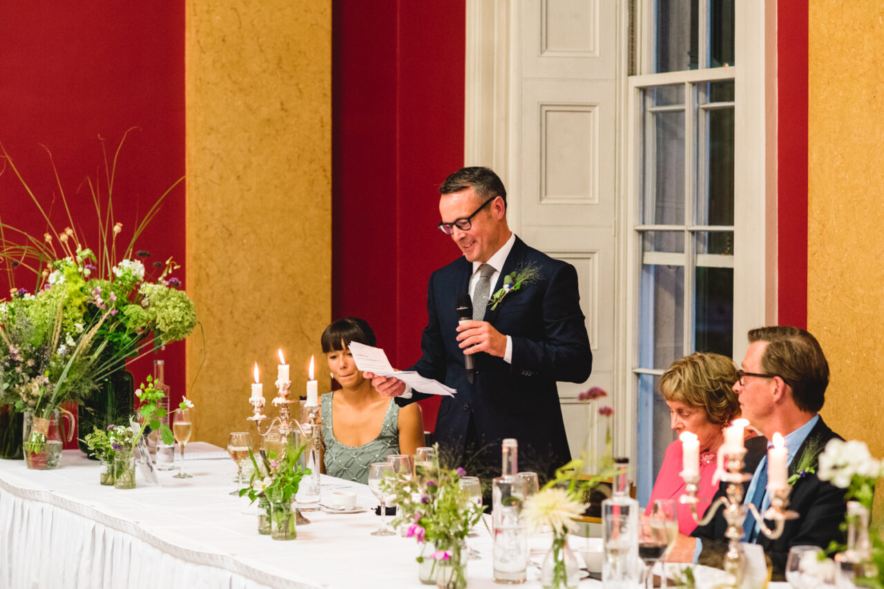 A guest gives a speech during the wedding breakfast.