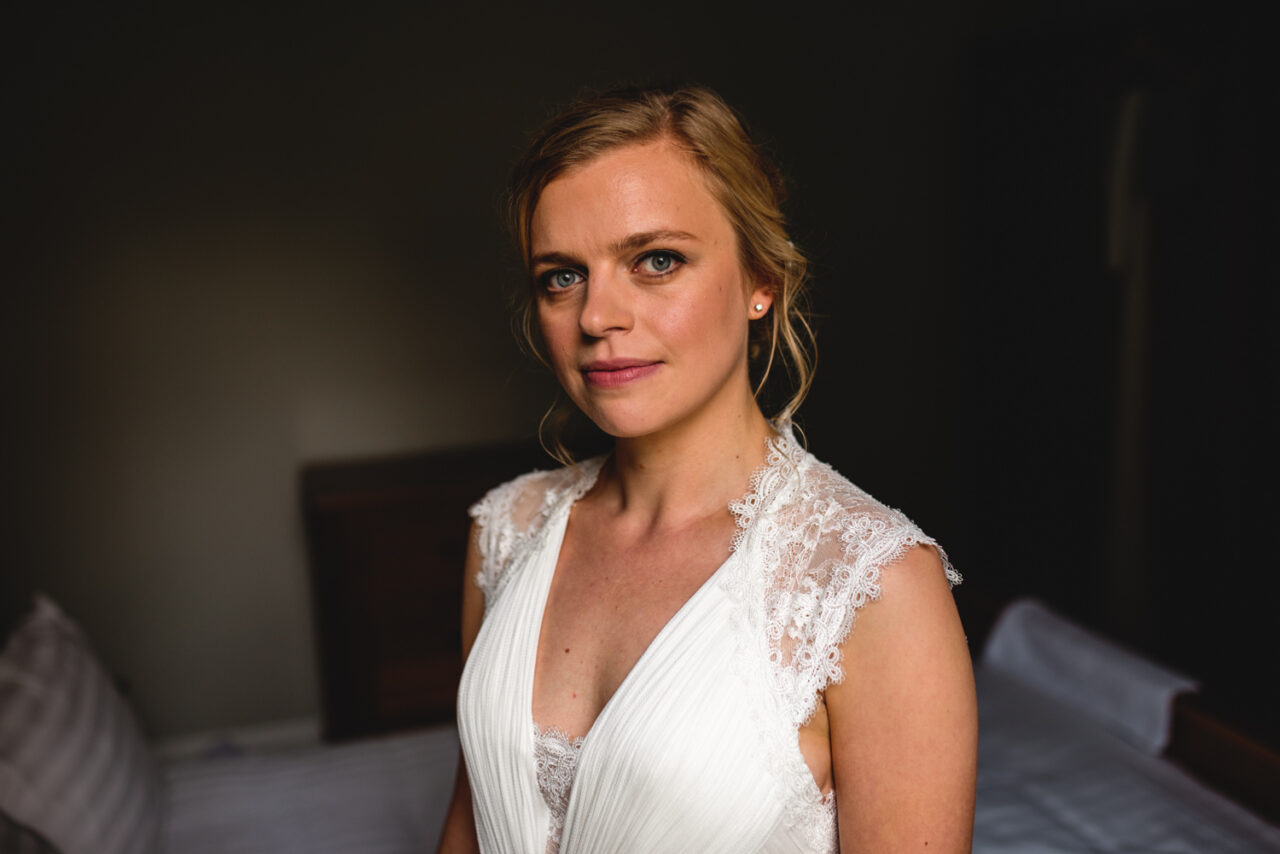 Portrait of a bride in the light of a window.