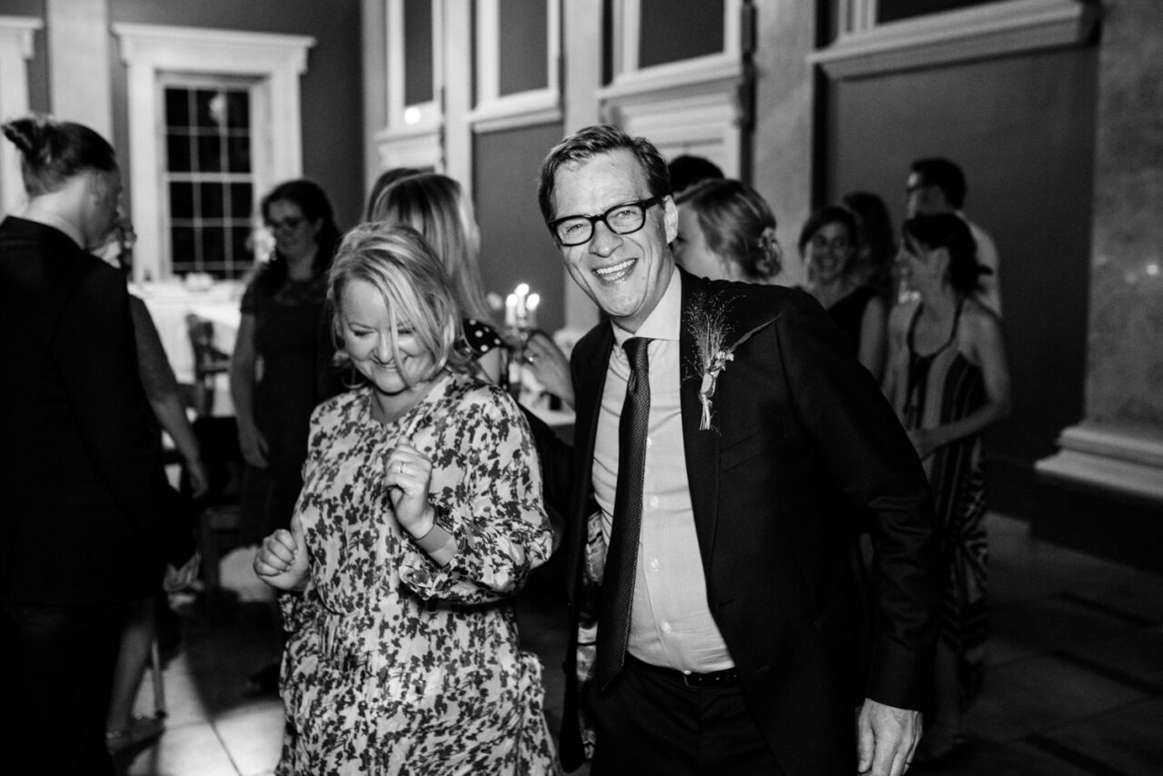 Guests dancing at a wedding.