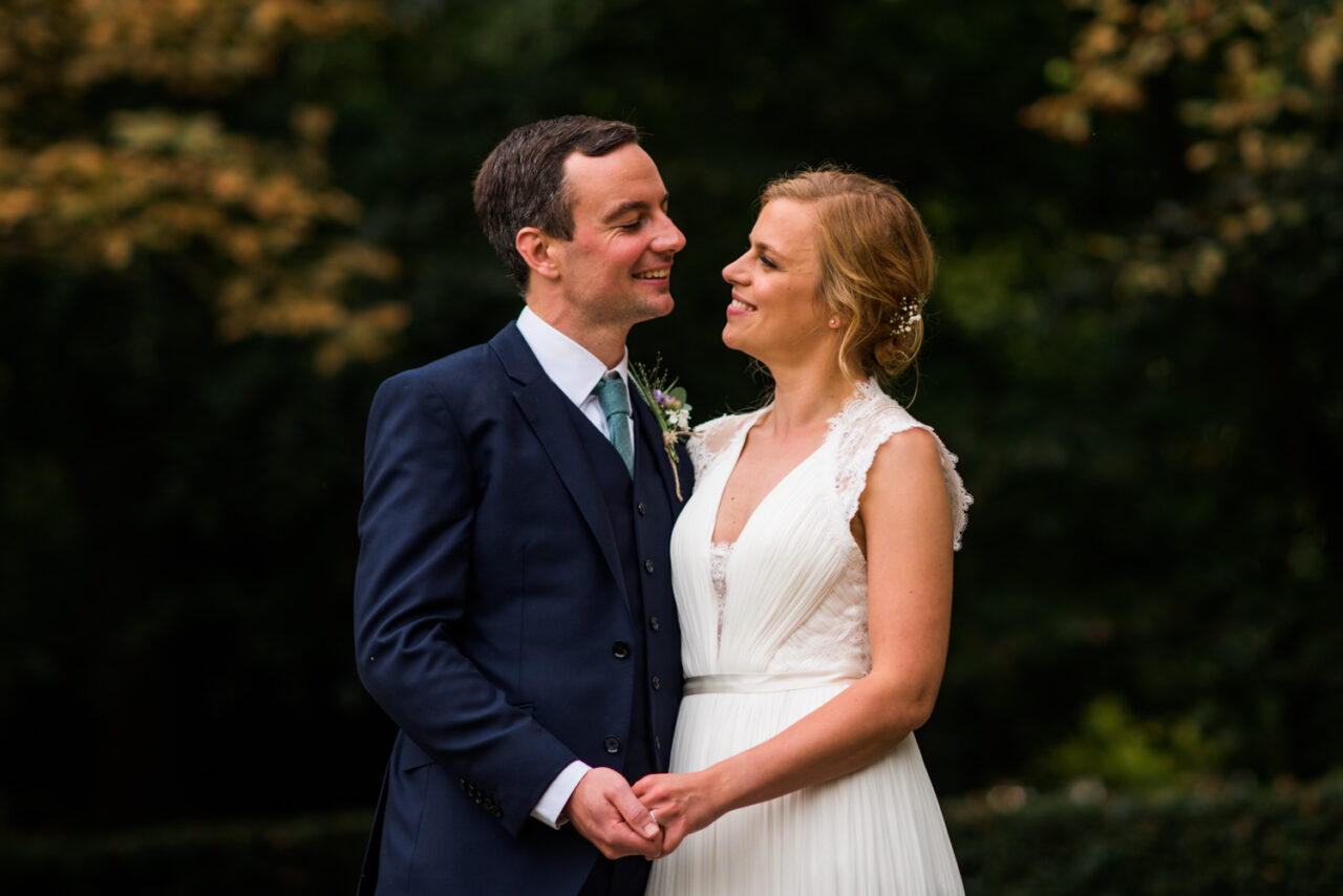 A bride and groom at Downing College.