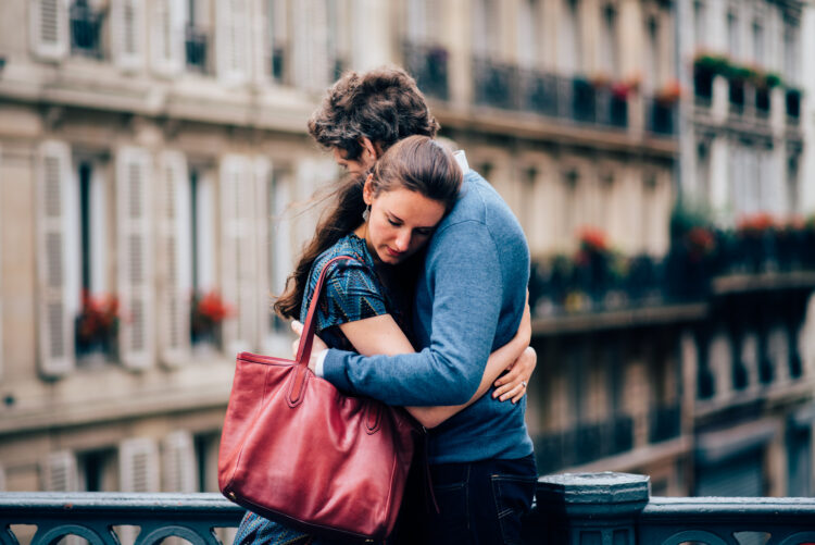 Portrait of a romantic couple embracing in Paris