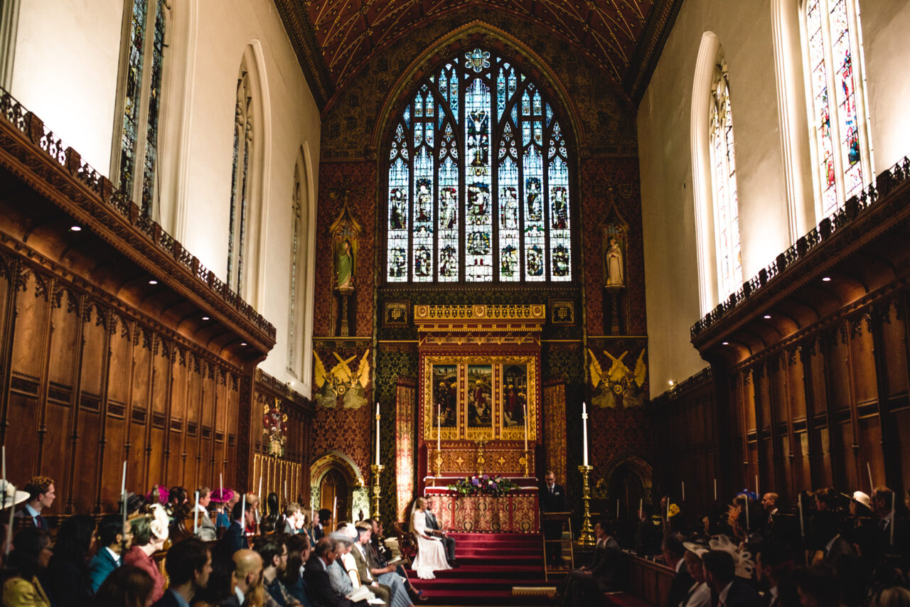 A wedding ceremony in the chapel at Queens' College in Cambridge.