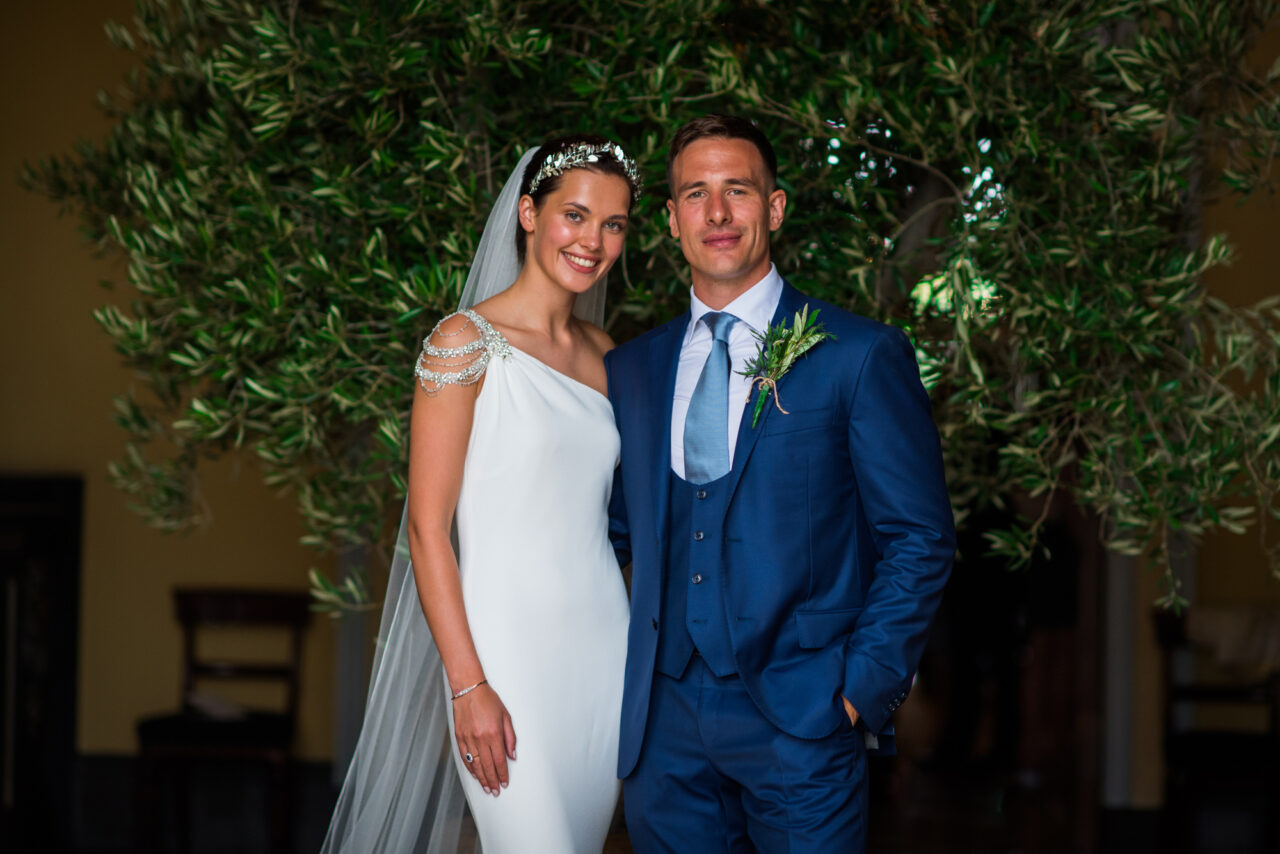 Wynyard Hall Wedding Photographer - A bride and groom in the doorway of Wynyard Hall.