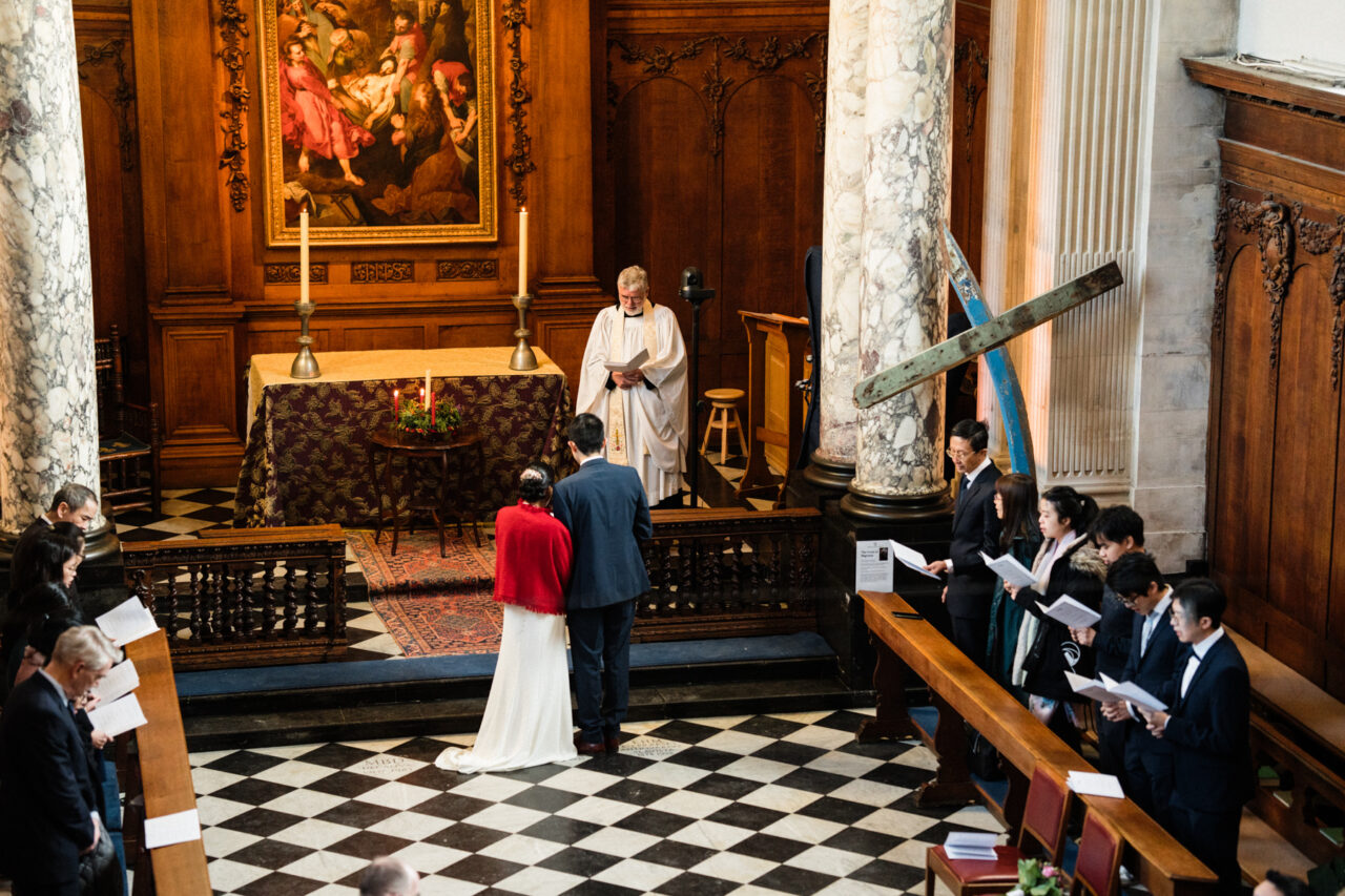 Pembroke College Cambridge Wedding Photographer. Wedding ceremony in Pembroke Chapel.