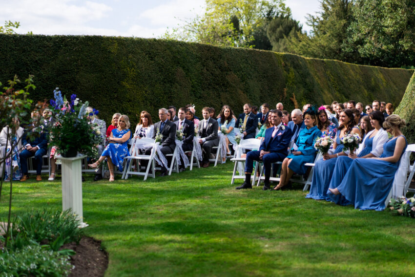 The wedding guests at an outside ceremony at Hockwold Hall.