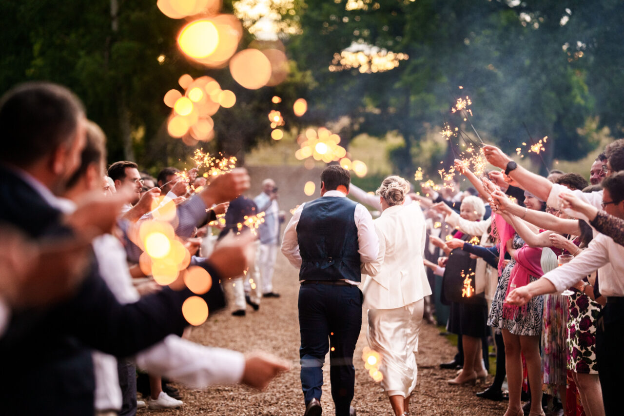 Sparklers in the evening at a wedding at Longstowe Hall near Cambridge.