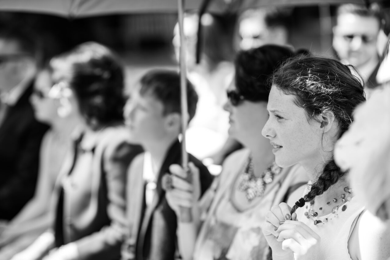 A wedding guest in the sunshine at South Farm wedding venue in Royston.