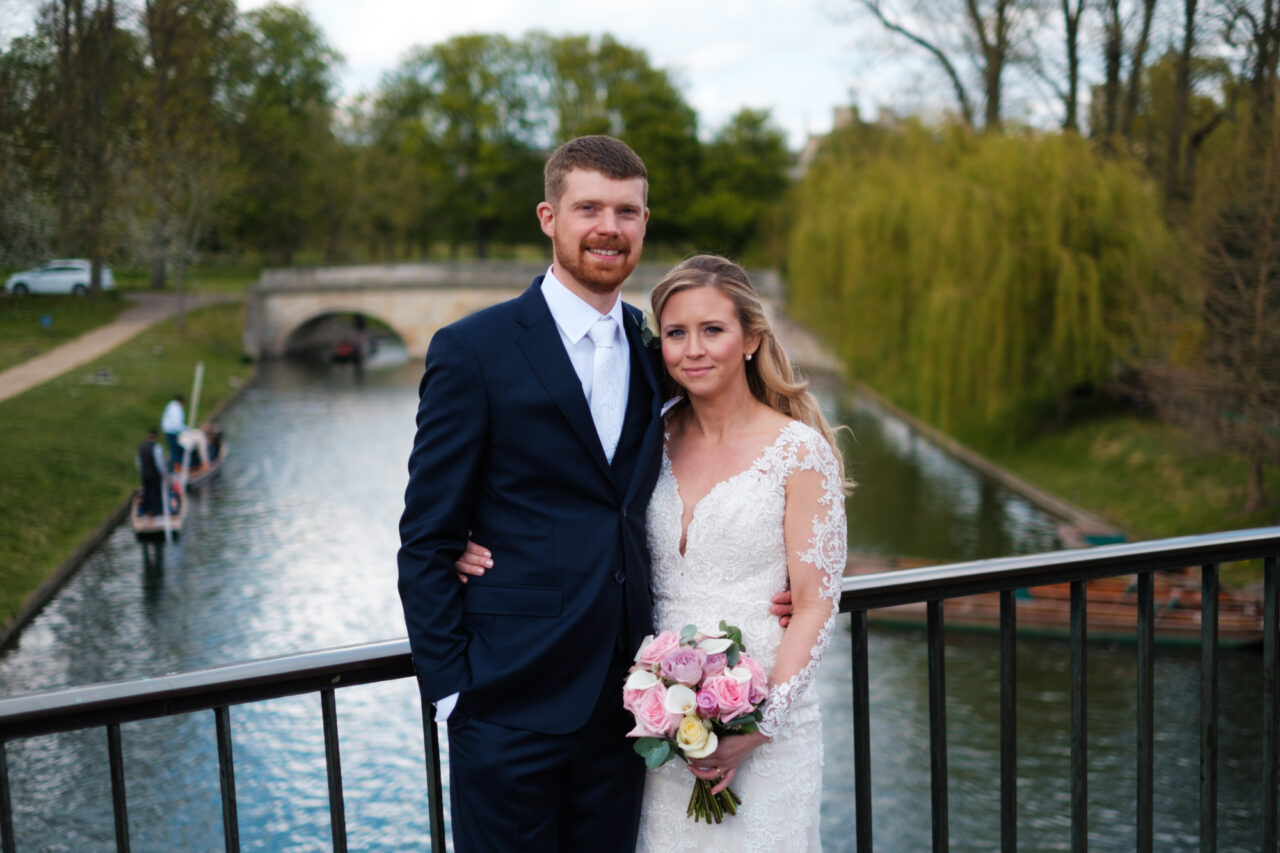 A couple pose on Garret Hostel Bridge in Cambridge.