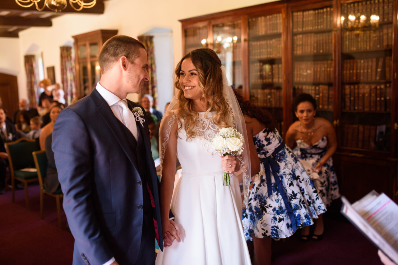 Wedding ceremony in The Munro Room at Queens' College in Cambridge.