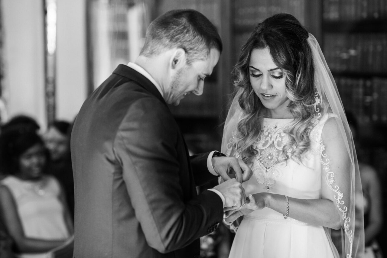 Wedding ceremony in The Munro Room at Queens' College in Cambridge.