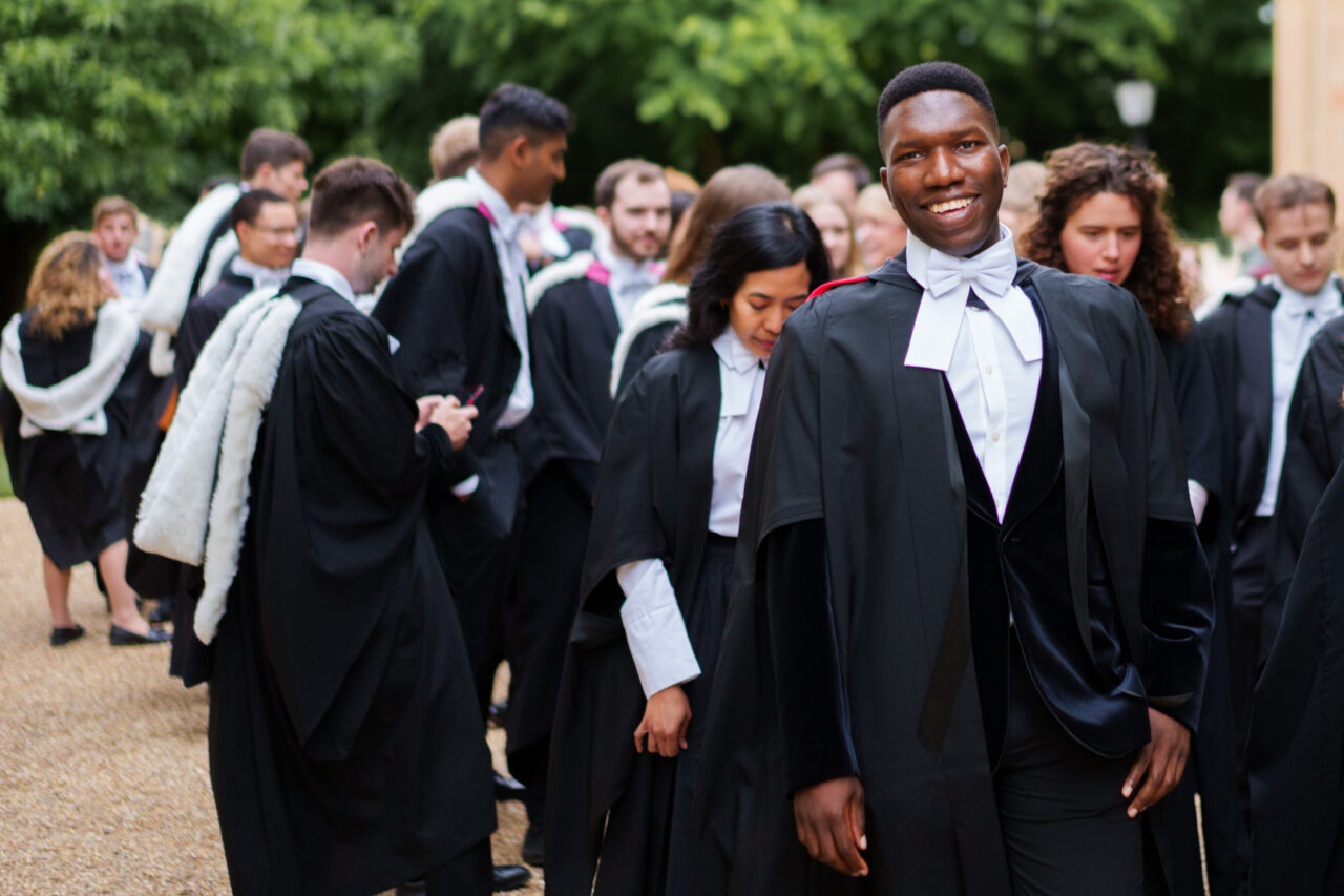 Cambridge graduates prepare to walk to the Senate House for their ceremony.
