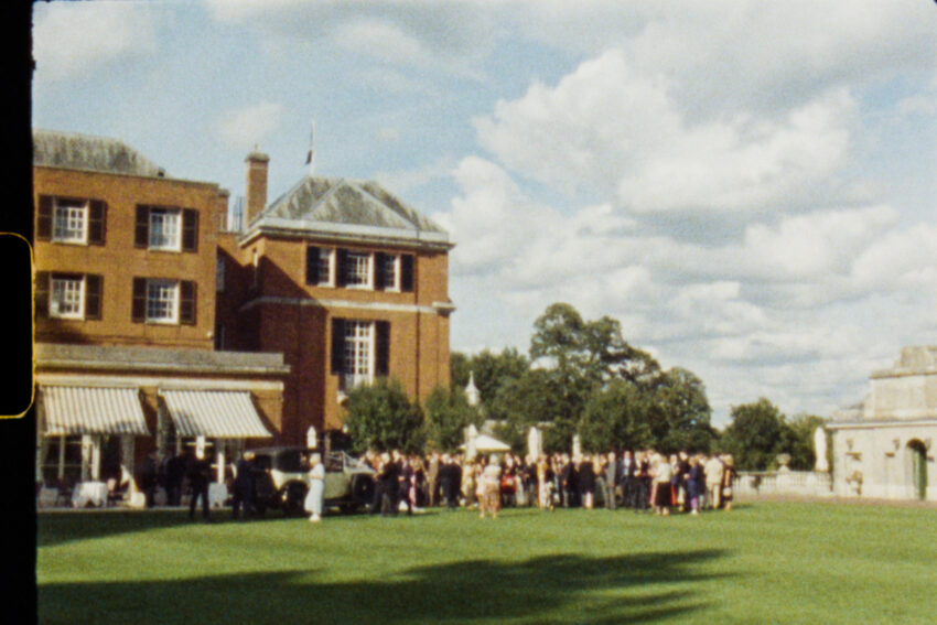 Frame from a Super 8 wedding video - a beautiful wedding venue in the sun.