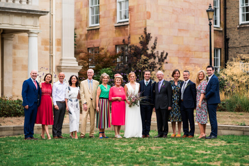 A family group photo at a wedding in Cambridge.