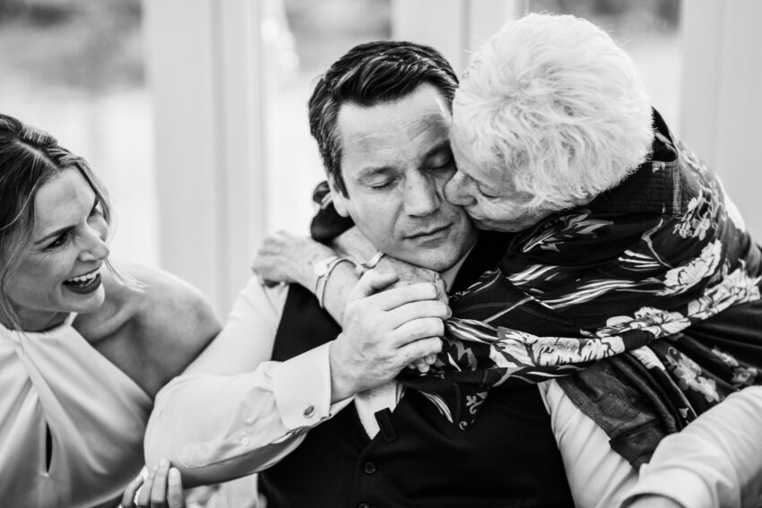 Emotional moment between a groom and his mother during the wedding celebrations