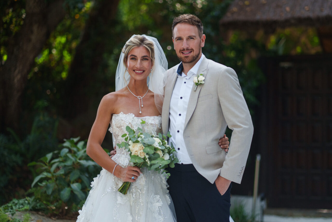 Elegant bride and groom portrait outdoors after the ceremony, Malaga wedding photography style