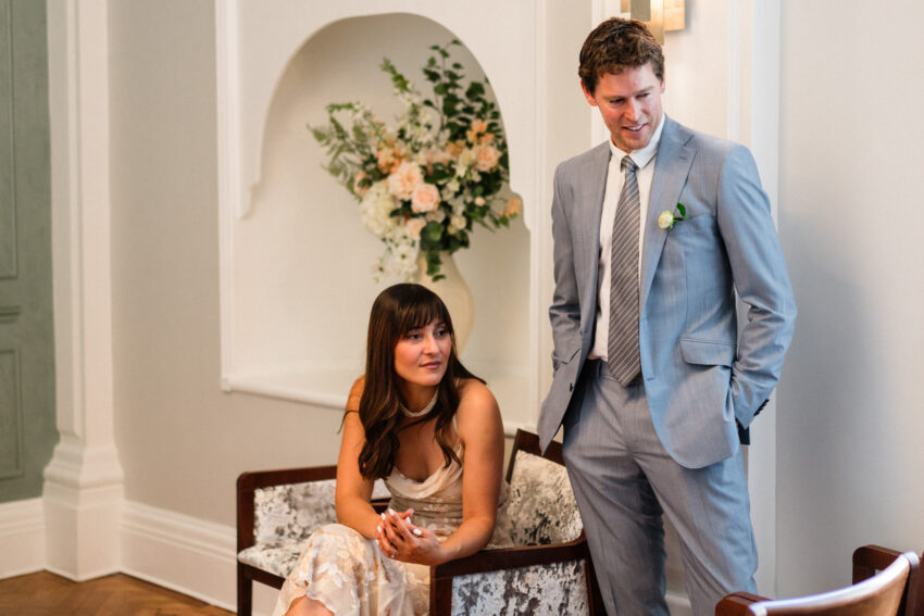 Bride and groom waiting in The Rossetti Room at Chelsea Old Town Hall.