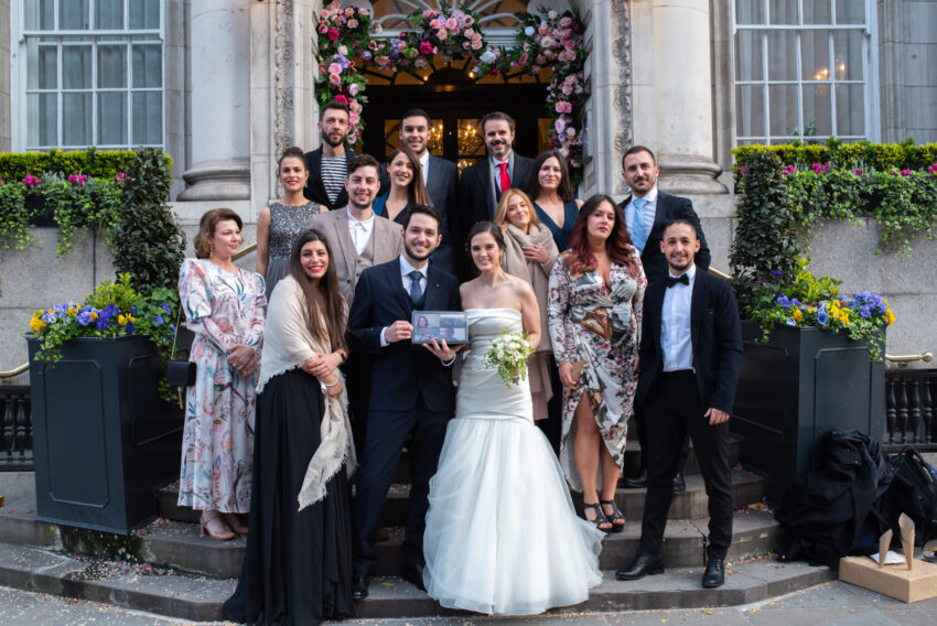Group photo on the steps outside Chelsea Old Town Hall in London.