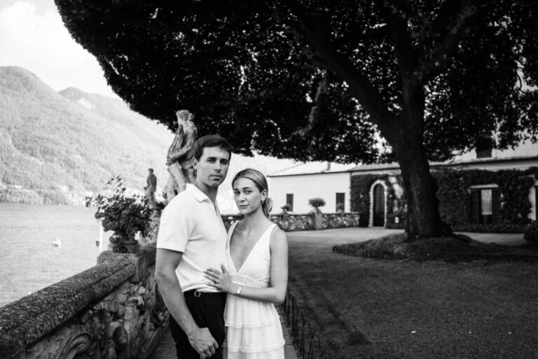 Black and white couple portrait in the gardens of Villa del Balbianello, Lake Como.
