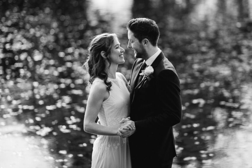 Bride and groom sharing a quiet moment together, natural connection in Colchester.