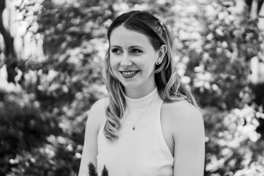 Black and white portrait of the bride outdoors after her Islington Town Hall wedding.