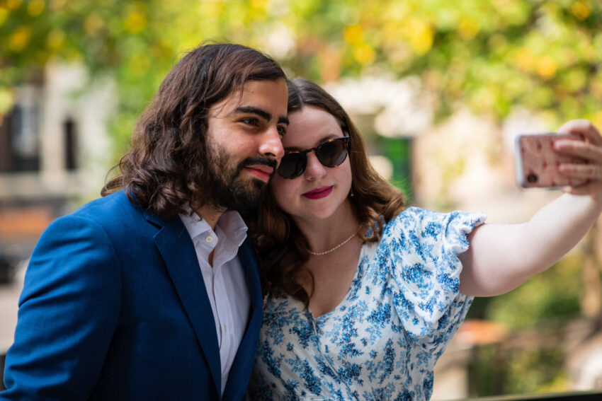 Guests outdoors after the wedding, photographed near Islington Town Hall.