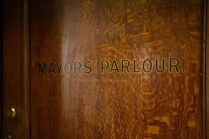 Detail photograph of the Mayor’s Parlour sign inside Islington Town Hall.