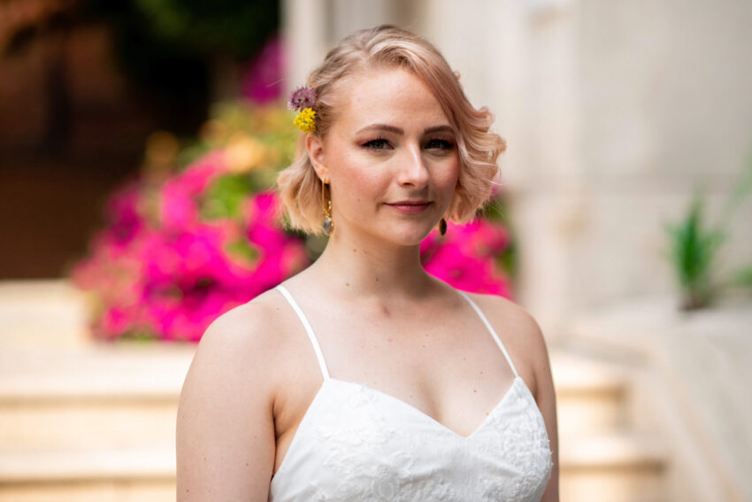 Relaxed portrait of the bride outdoors after her Islington Town Hall wedding.