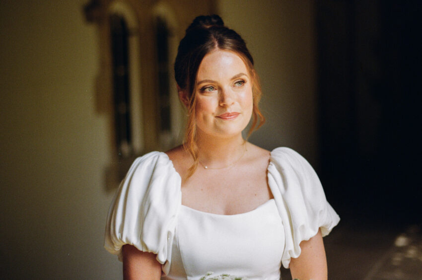 Portrait of a bride in soft natural light on Portra 400 film.
