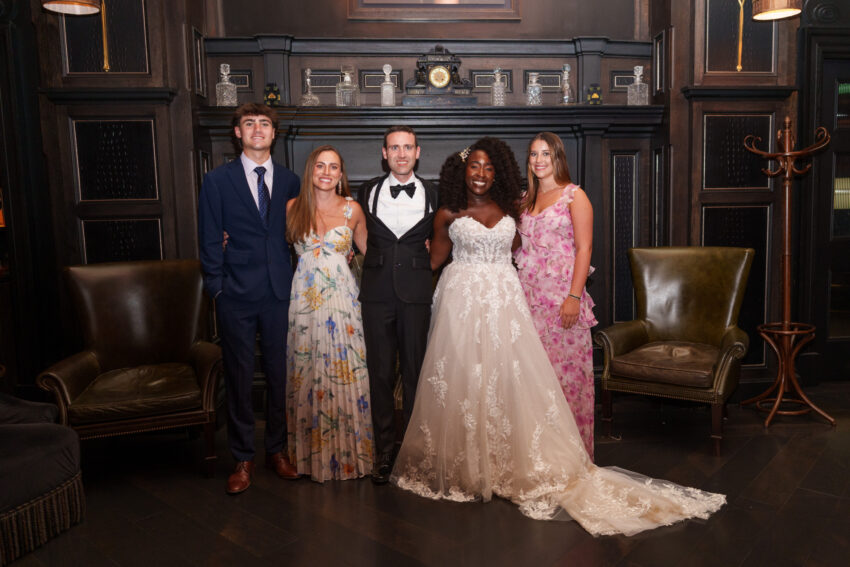 Wedding group portrait inside a private room at Kimpton Fitzroy London.