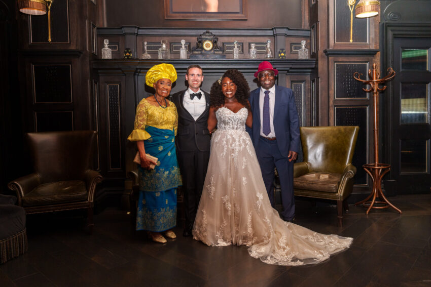 Wedding group portrait inside Kimpton Fitzroy London following the ceremony.