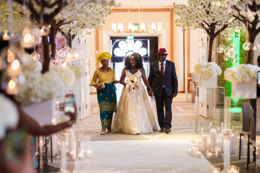 Bride entering the ceremony aisle at Kimpton Fitzroy London.