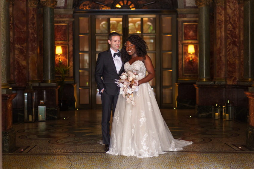Bride and groom at Kimpton Fitzroy Hotel on their wedding day.