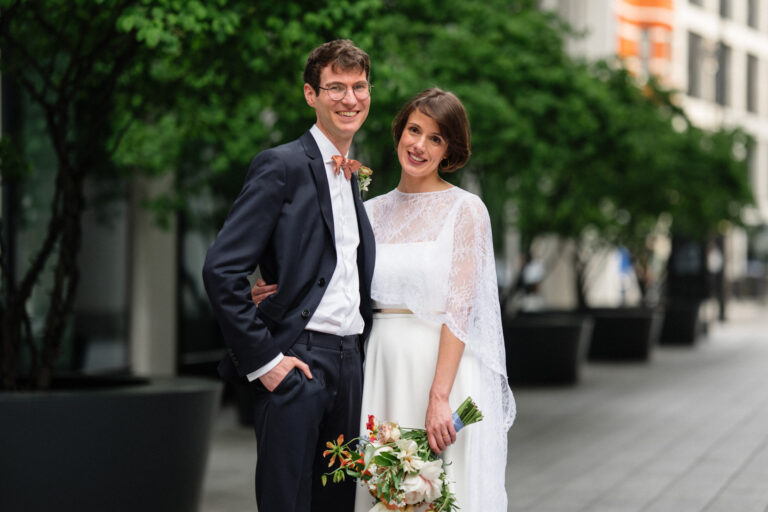 Bride and groom portrait in Fitzrovia, London, relaxed couple photoshoot in the city