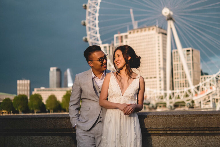 Couple portrait on the South Bank with the London Eye in the background, golden evening light
