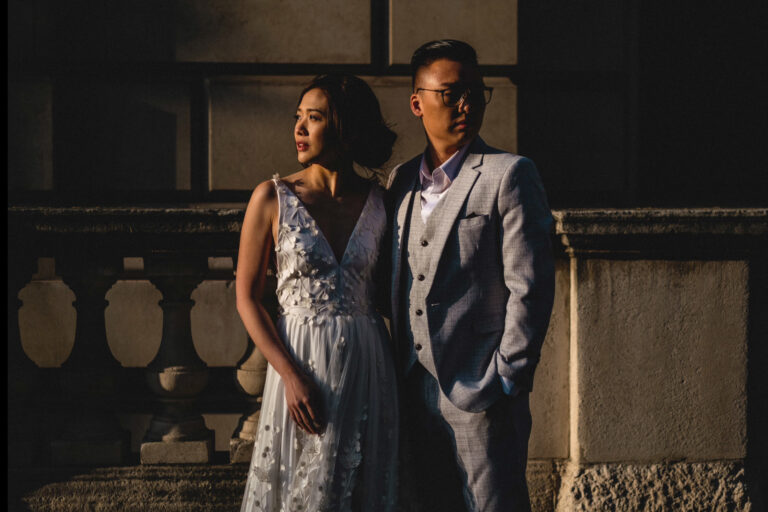 Closeup portrait of bride and groom in dramatic evening light on Horseguards Avenue