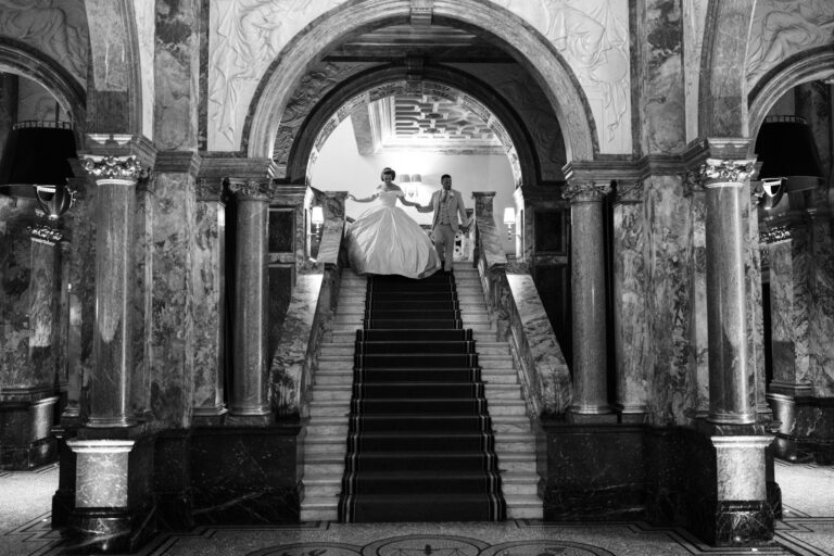 Black and white bridal portrait on the grand staircase at the Kimpton Fitzroy London hotel