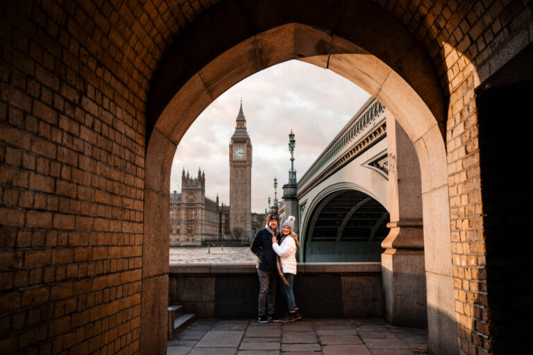 Couple portrait with Big Ben and Westminster in the background, photographed from Westminster Bridge, London