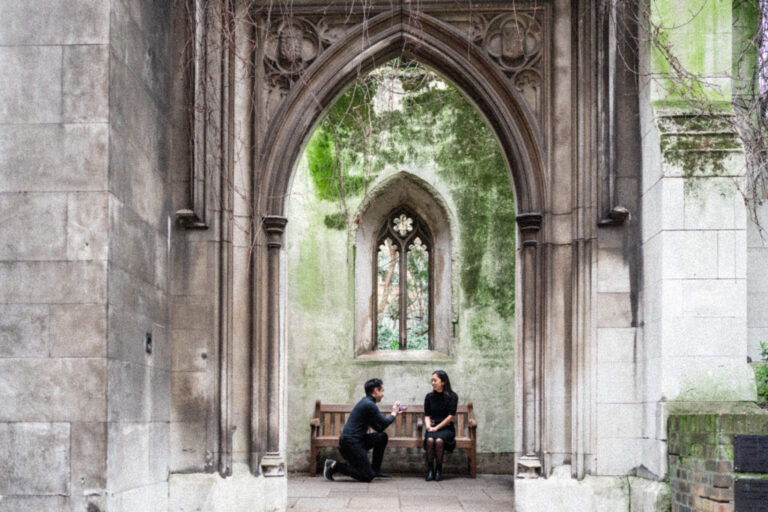 Couple photoshoot under the arches at St Dunstan in the East Church Garden, London