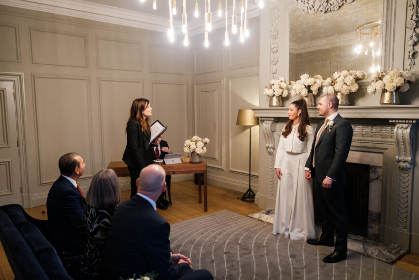 Wedding ceremony taking place in the Pimlico Room at Old Marylebone Town Hall.