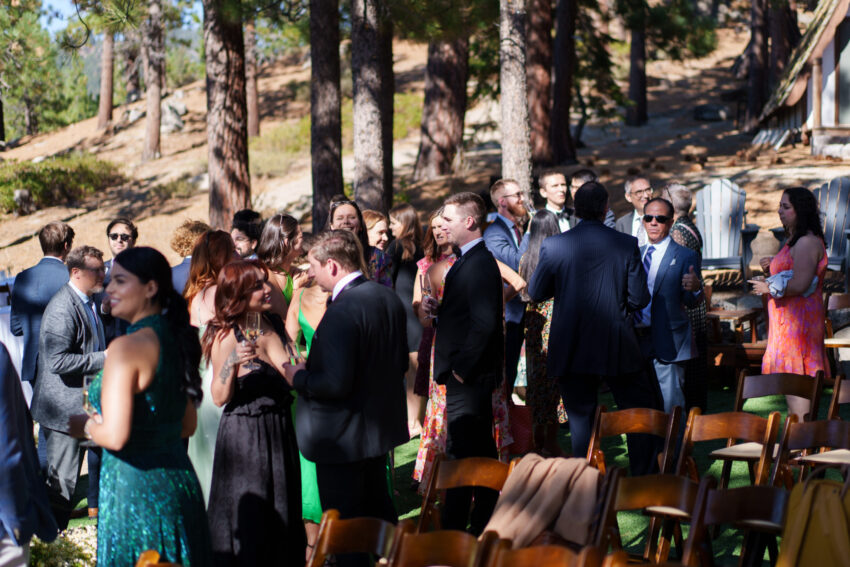 Guests gathering outdoors before the ceremony at Tahoe Mountain Home.