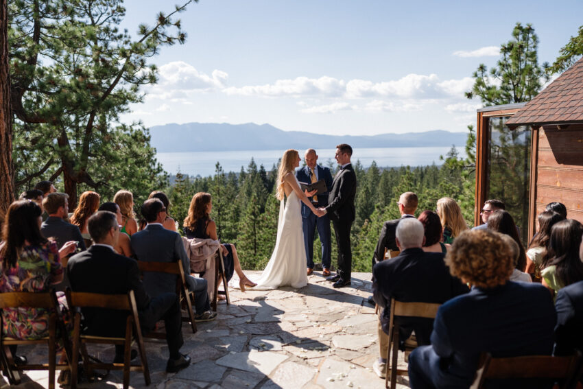 Bride and groom exchanging vows during their Lake Tahoe wedding ceremony.
