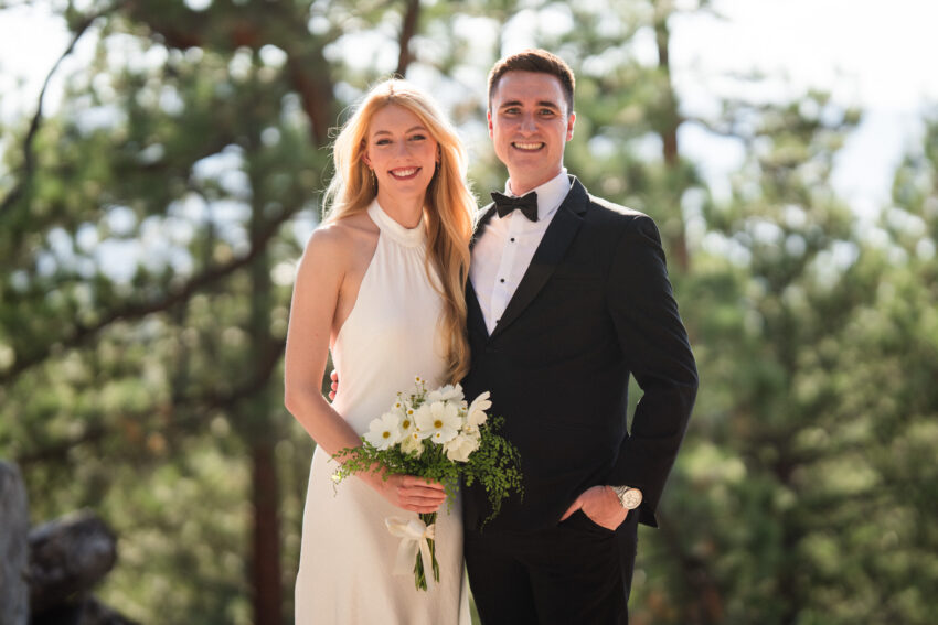 Bride and groom smiling together during their wedding at Tahoe Mountain Home overlooking Lake Tahoe in South Lake Tahoe, Nevada.