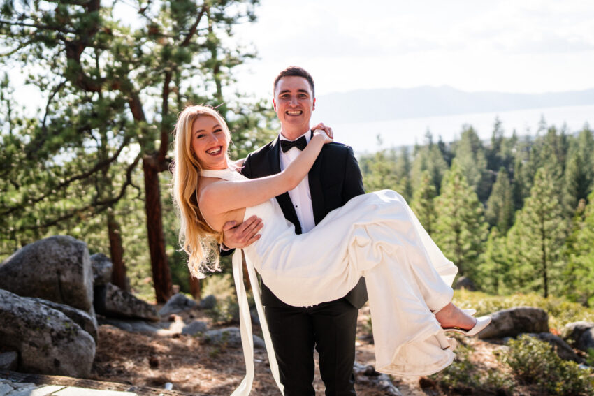 Groom lifting the bride during a playful portrait at Tahoe Mountain Home.