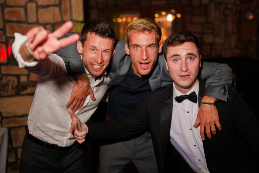 Groom celebrating with friends during the evening party at Tahoe Mountain Home.