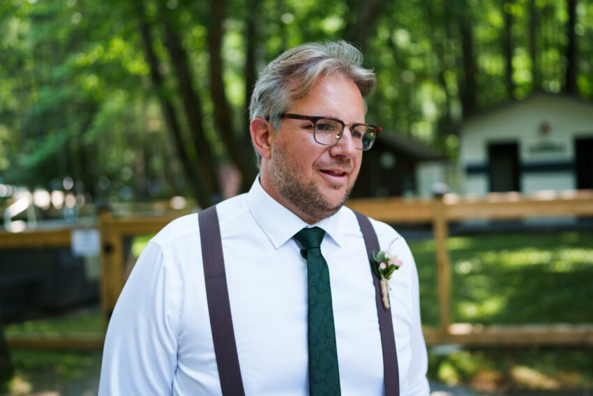Groomsman portrait outdoors before the ceremony at Trillium Resort & Spa in Muskoka, Ontario.
