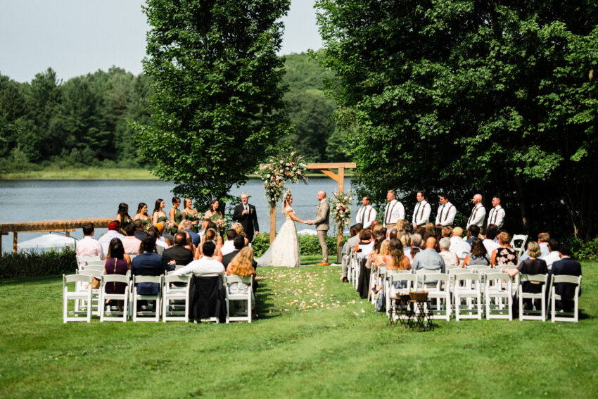 Outdoor wedding ceremony beside the lake at Trillium Resort & Spa in Muskoka, Ontario.