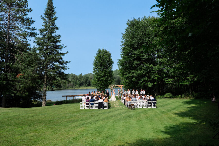 Wide view of the lakeside ceremony setting at Trillium Resort & Spa in Muskoka.