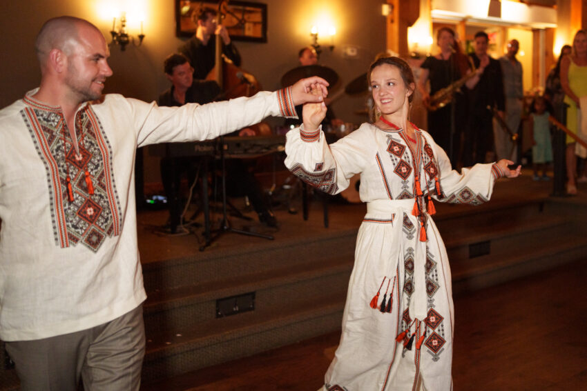 Bride and groom dancing together during the evening celebration at Trillium Resort & Spa.